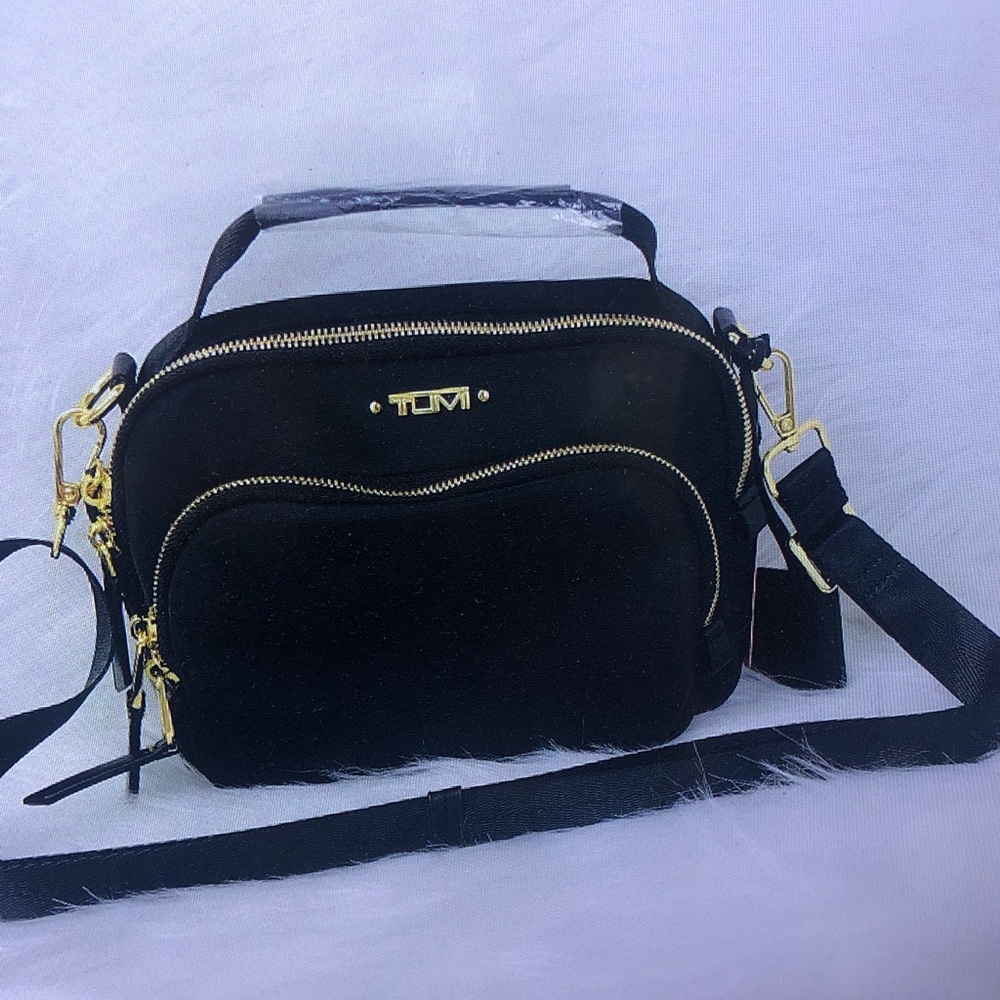 TUMI Black Crossbody Bag with Gold Accents